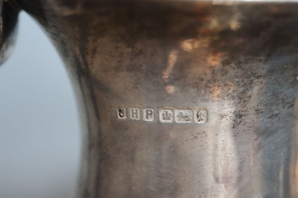 A George V demi-fluted silver four piece tea and coffee service, John Henry Potter, Sheffield, 1911, gross 65oz.